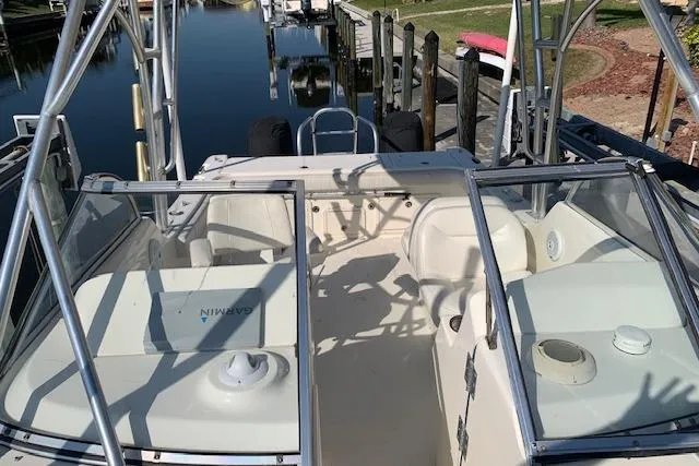 Slide: The Image of 2007 World Cat 250 DC boat interior with seating and clear windshield. - 10