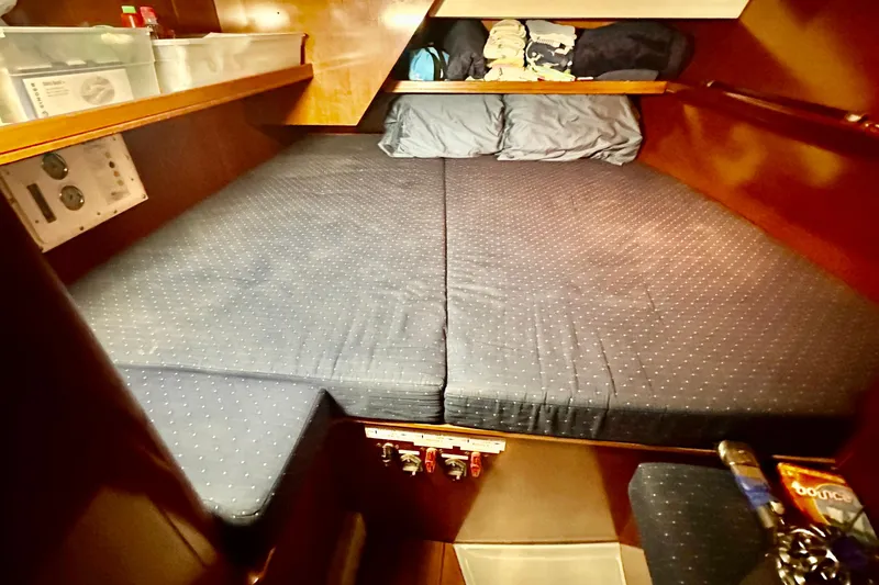 Slide: The Image of Cozy cabin interior of 2004 Beneteau 50 sailboat with comfortable bedding. - 19