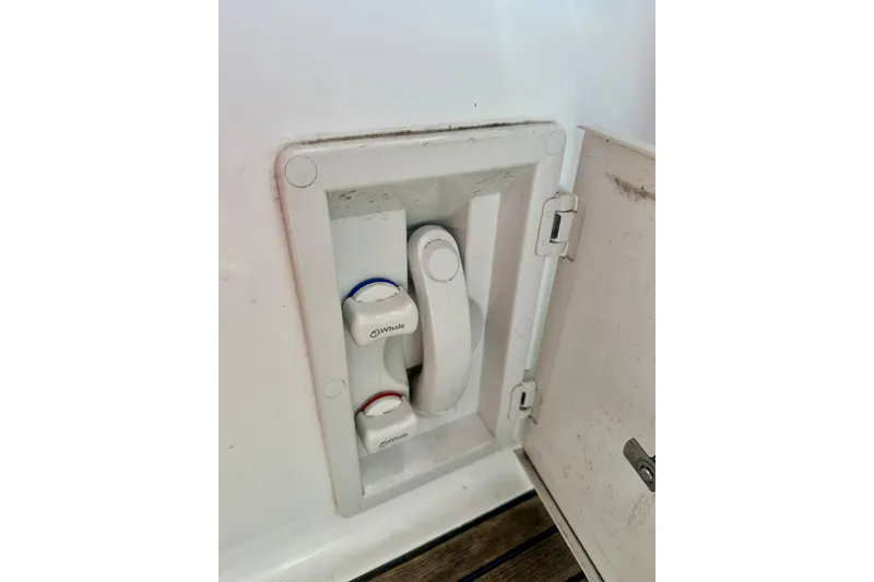 Slide: The Image of Water control panel on a 2004 Beneteau 50 yacht, featuring Whale brand valves. - 48