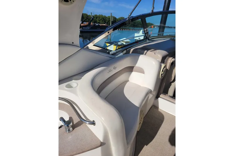 Slide: The Image of 2003 Sea Ray 320 Sundancer interior with seating and water view. - 8