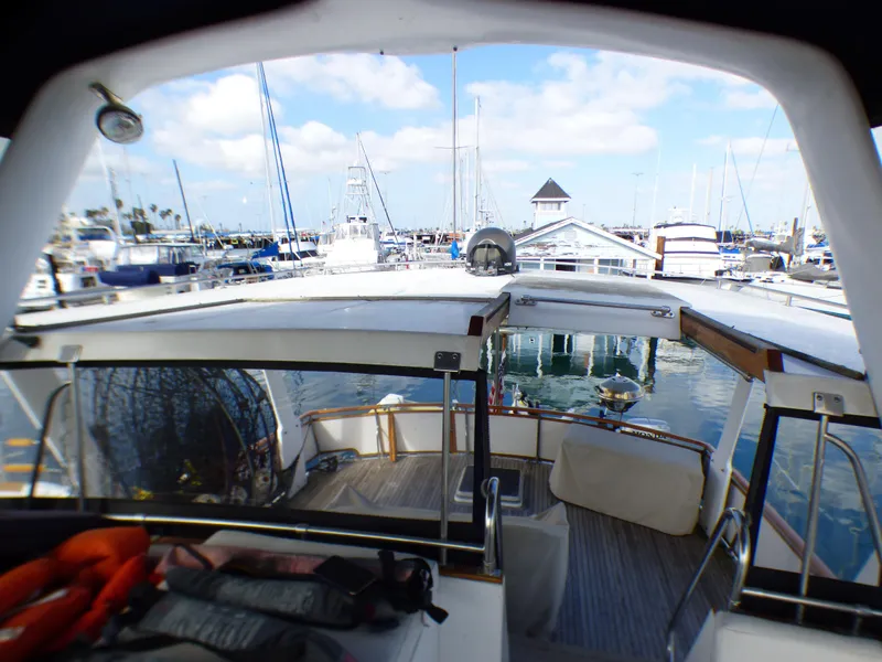Slide: The Image of 1984 Spindrift 39 ft. Aft Cabin Twin Diesel yacht docked at marina. - 15
