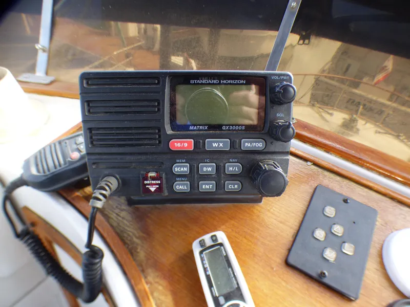 Slide: The Image of VHF marine radio on 1984 Spindrift 39 ft. Aft Cabin Twin Diesel boat dashboard. - 19