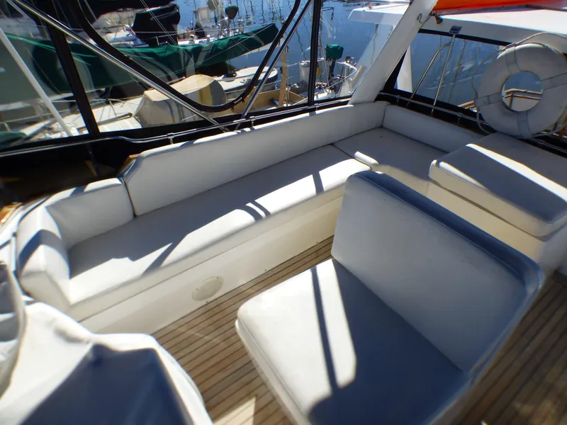 Slide: The Image of Flybridge Captain's Seat, and Starboard Bench Seat - 24