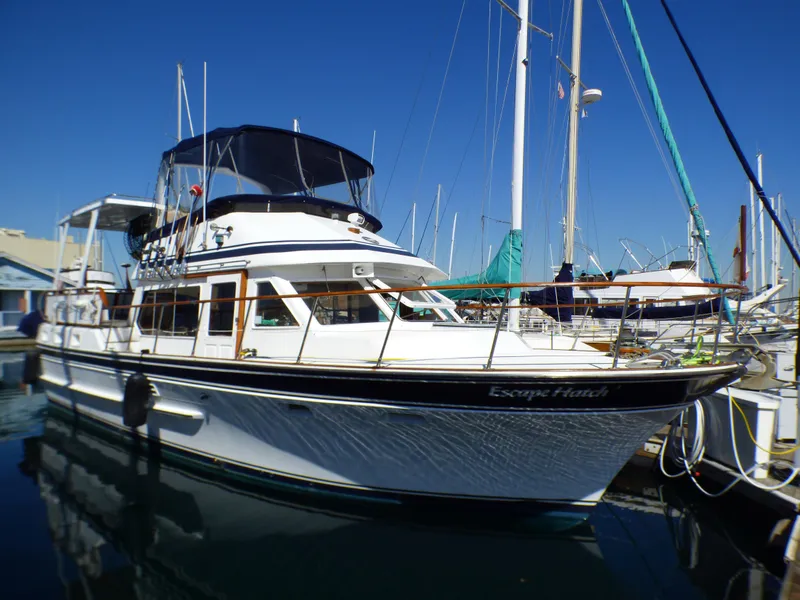 Slide: The Image of 1984 Spindrift 39 ft. Aft Cabin Twin Diesel yacht docked in marina. - 3