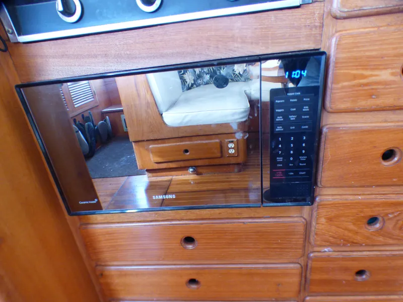 Slide: The Image of Microwave in 1984 Spindrift 39 ft. Aft Cabin Twin Diesel yacht kitchen. - 42