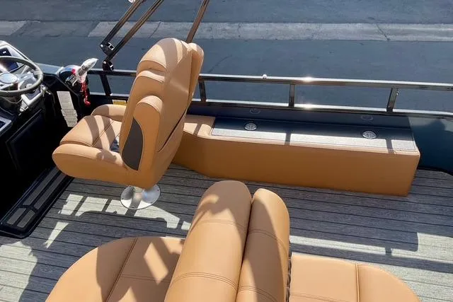 Slide: The Image of Luxurious seating on 2026 Ranger Reata 220F boat with tan upholstery and sleek design. - 17