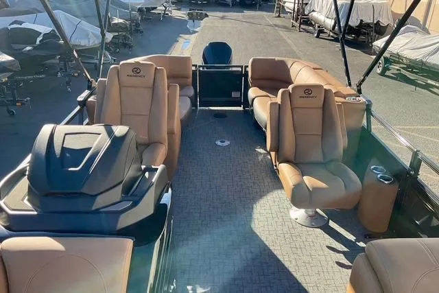 Slide: The Image of Luxurious 2026 Regency 250DL pontoon boat with spacious seating and modern design. - 17