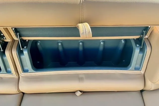 Slide: The Image of Rear seat storage compartment in 2026 Regency 250DL boat. - 19