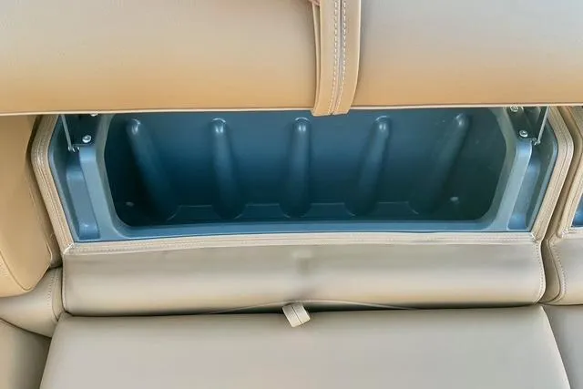 Slide: The Image of Rear seat storage compartment in 2026 Regency 250DL boat. - 24
