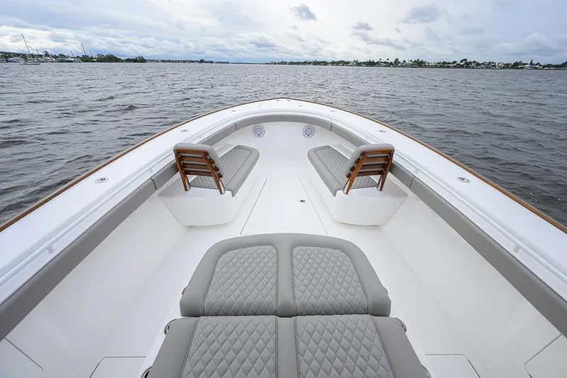 Slide: The Image of 2024 Valhalla Boatworks V-41, spacious deck with luxurious seating on open water. - 13