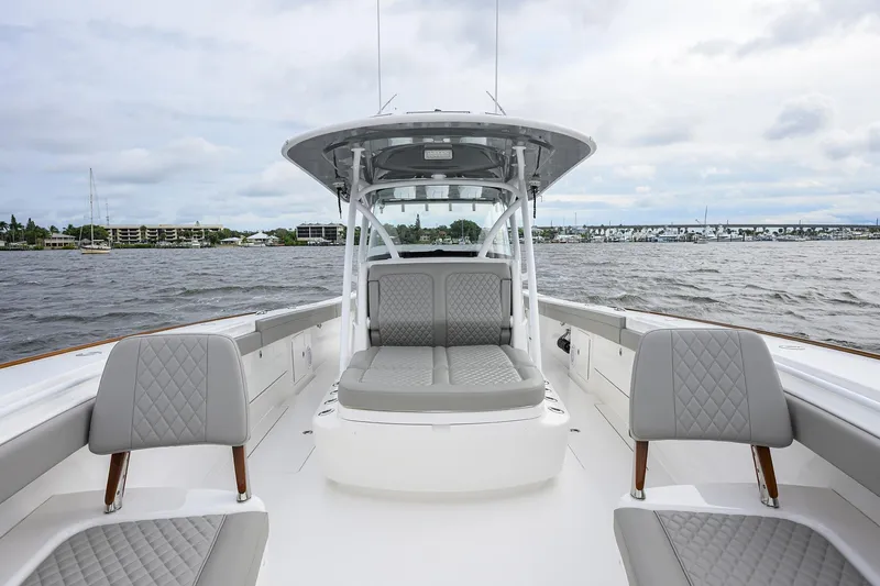 Slide: The Image of 2024 Valhalla Boatworks V-41 interior with gray seating on open water. - 16