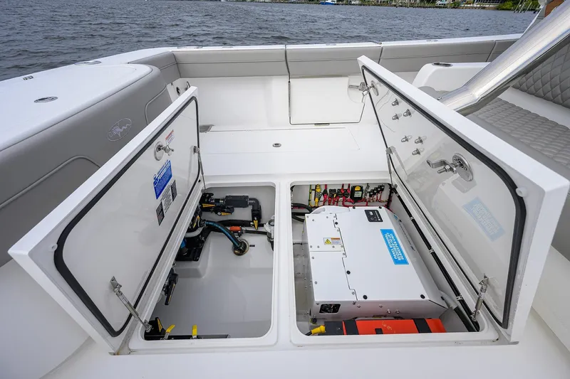 Slide: The Image of 2024 Valhalla Boatworks V-41 engine compartment with open hatches, showcasing internal components. - 29