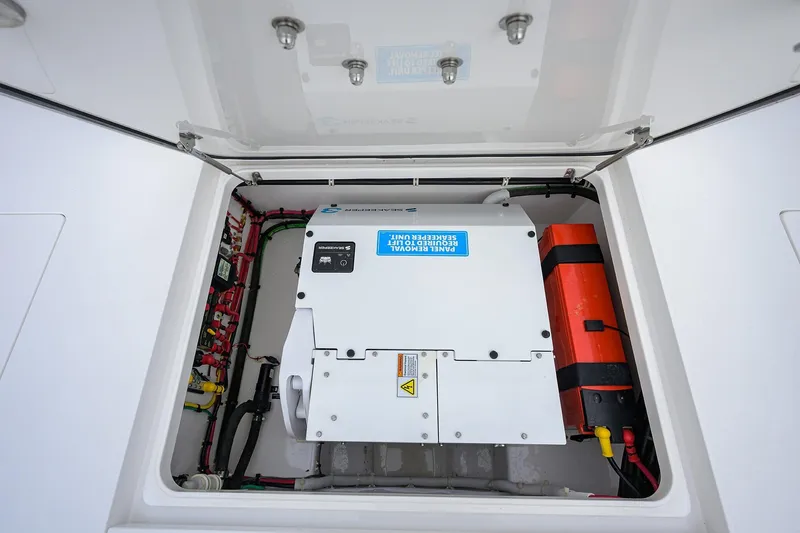 Slide: The Image of 2024 Valhalla Boatworks V-41 engine compartment with electrical components and wiring. - 30