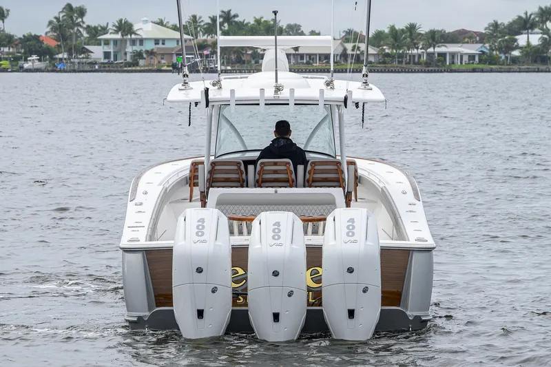 Slide: The Image of 2024 Valhalla Boatworks V-41 with triple 400 V10 engines on the water. - 6