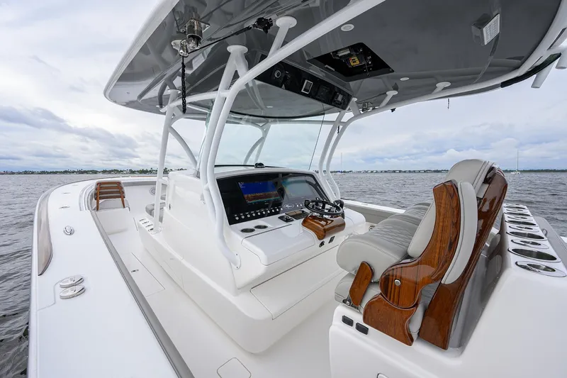 Slide: The Image of 2024 Valhalla Boatworks V-41, luxury helm with advanced navigation, on open water. - 9