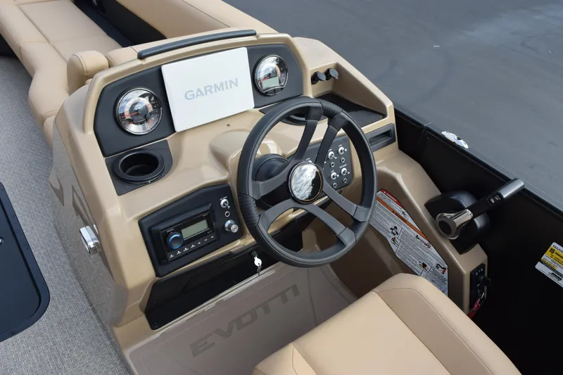 Slide: The Image of Evotti 525QL 2026 boat dashboard with Garmin navigation system and steering wheel. - 12