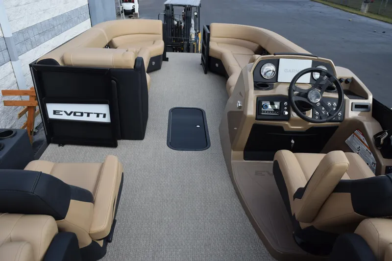 Slide: The Image of Luxurious 2026 Evotti 525QL boat interior with plush seating and modern dashboard. - 16