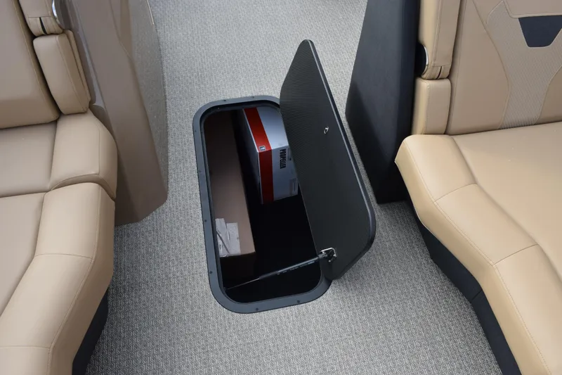 Slide: The Image of 2026 Evotti 525QL interior storage compartment with beige seating and carpeted floor. - 17