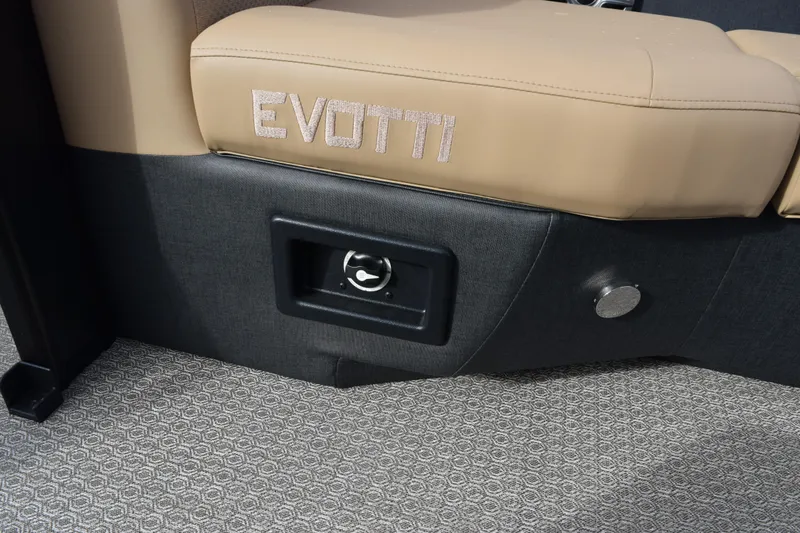 Slide: The Image of Beige and black Evotti 525QL seat detail, 2026 model, with textured flooring. - 24