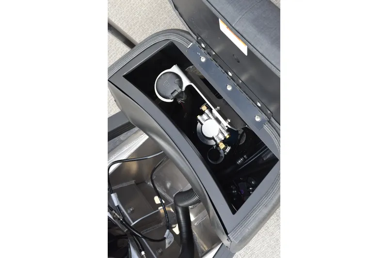 Slide: The Image of Open compartment of 2026 Evotti 525QL showing internal components and wiring. - 30