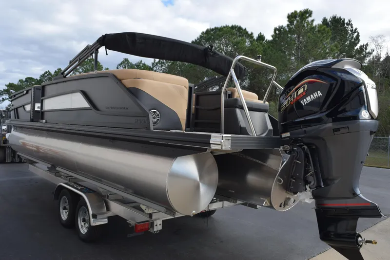 Slide: The Image of 2026 Evotti 525QL pontoon boat with Yamaha engine on a trailer. - 6