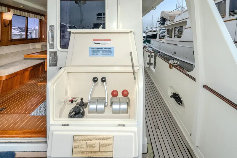 Slide: The Image of 2001 Fleming 55 Pilothouse yacht controls and interior view at dock. - 5
