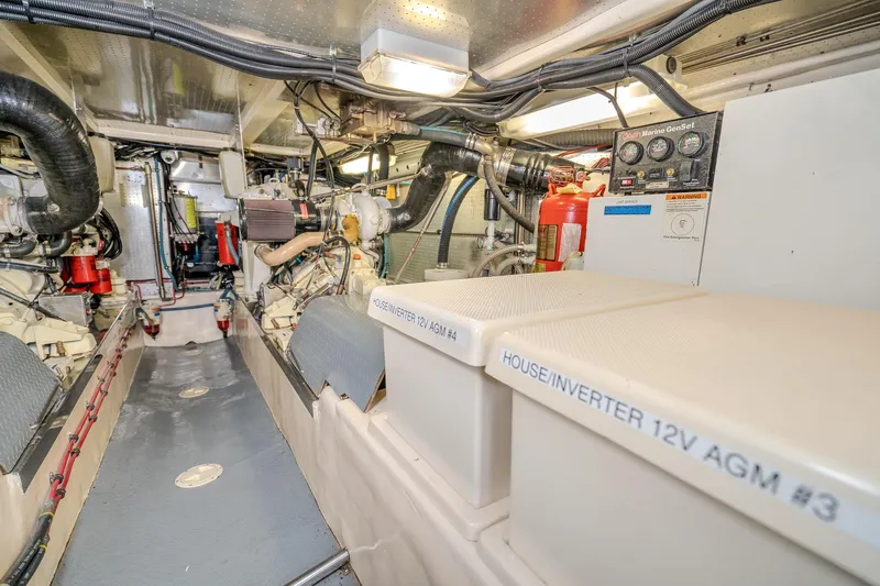 Slide: The Image of Engine room of 2001 Fleming 55 Pilothouse with inverters and marine equipment. - 91