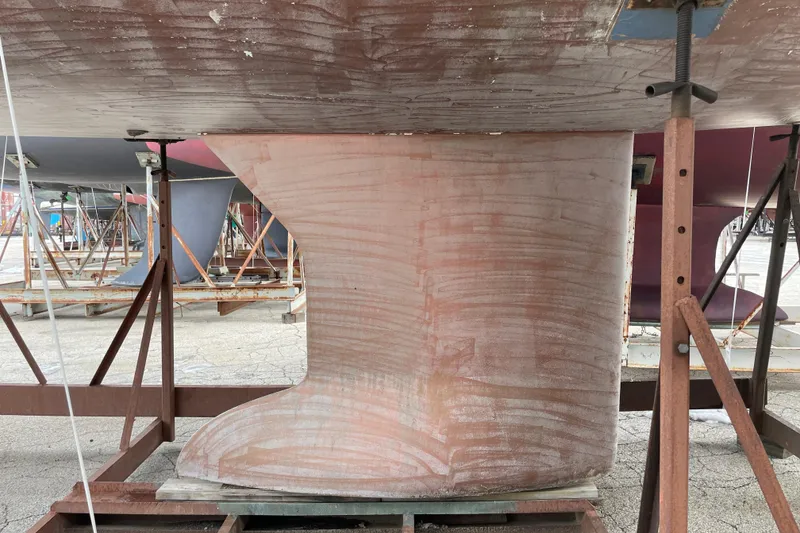 Slide: The Image of 2014 Jeanneau Sun Odyssey 439 hull with bow thruster in dry dock. - 11