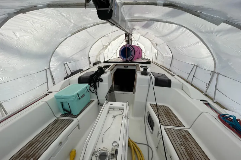 Slide: The Image of Interior view of 2014 Jeanneau Sun Odyssey 439 sailboat under protective cover. - 15