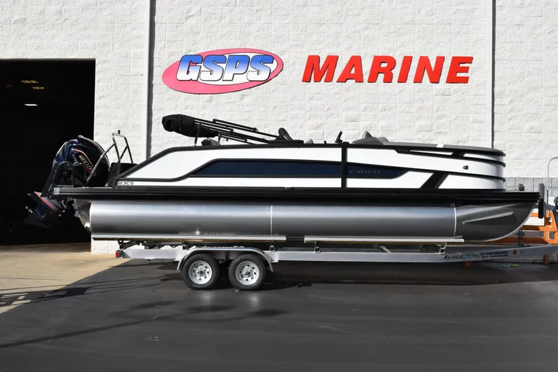The Image of 2026 Evotti 523CS pontoon boat on trailer at GSPS Marine dealership. - 1