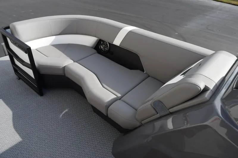 Slide: The Image of Luxurious seating on 2026 Evotti 523CS boat, featuring sleek gray upholstery and modern design. - 13