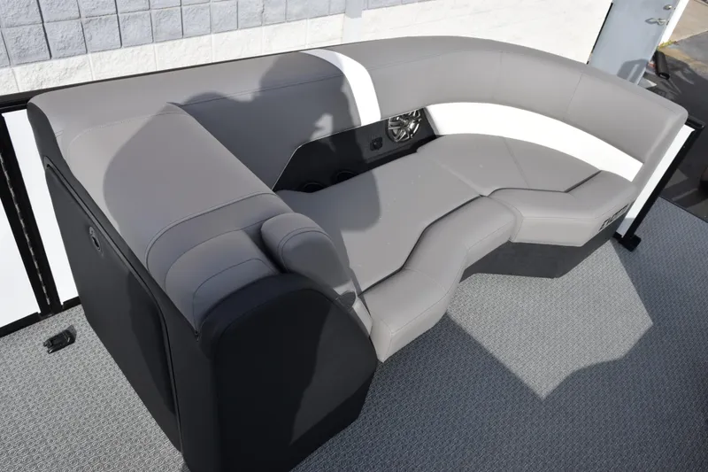 Slide: The Image of Luxurious seating on 2026 Evotti 523CS boat, featuring sleek gray upholstery. - 14