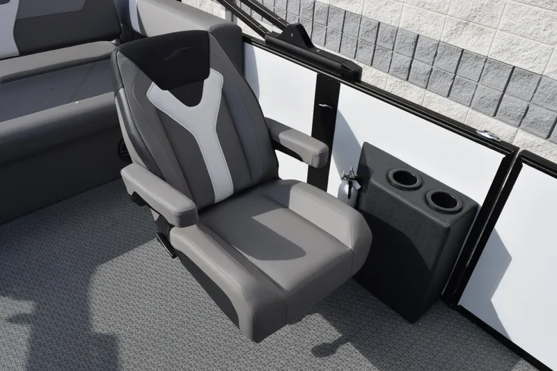 Slide: The Image of Gray captain's chair in 2026 Evotti 523CS boat interior with cup holders. - 15