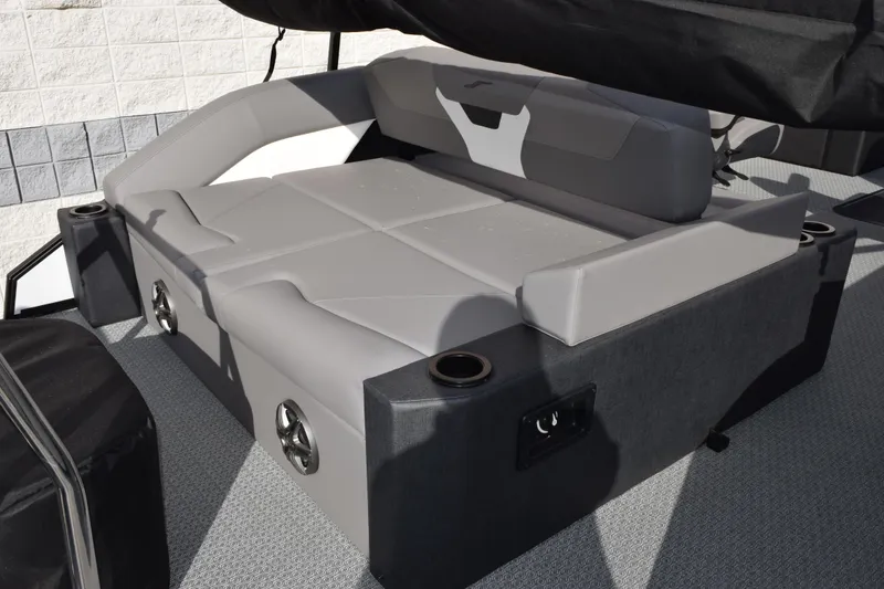 Slide: The Image of Luxurious seating on 2026 Evotti 523CS boat, featuring sleek gray upholstery and integrated cup holders. - 7