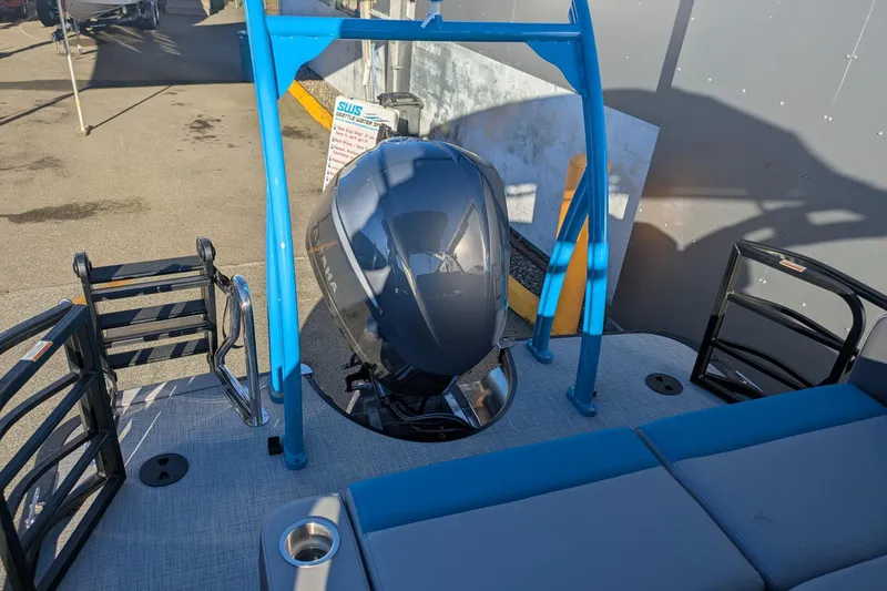Slide: The Image of 2026 Berkshire 23SB2 STS pontoon boat with Yamaha outboard motor, docked outdoors. - 15