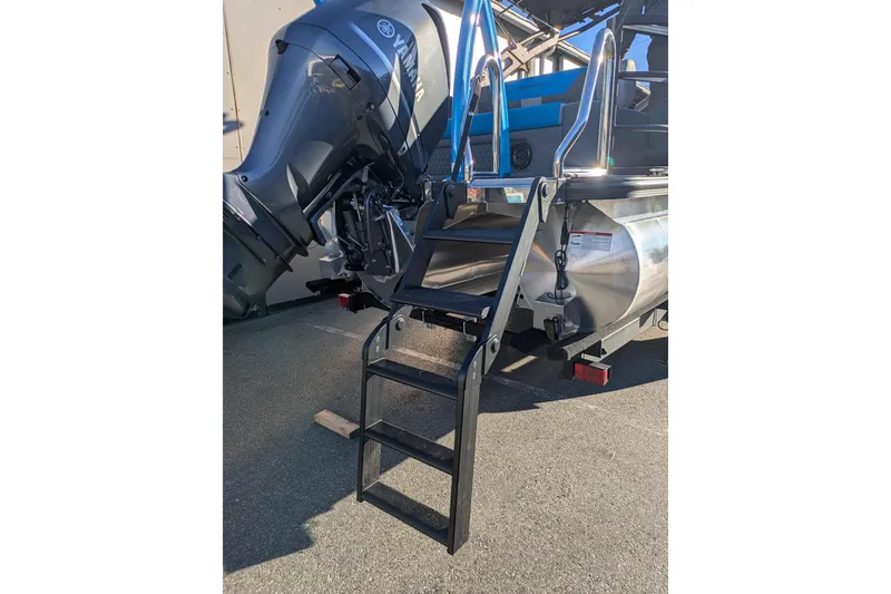 Slide: The Image of 2026 Berkshire 23SB2 STS boat with Yamaha engine and boarding ladder. - 19