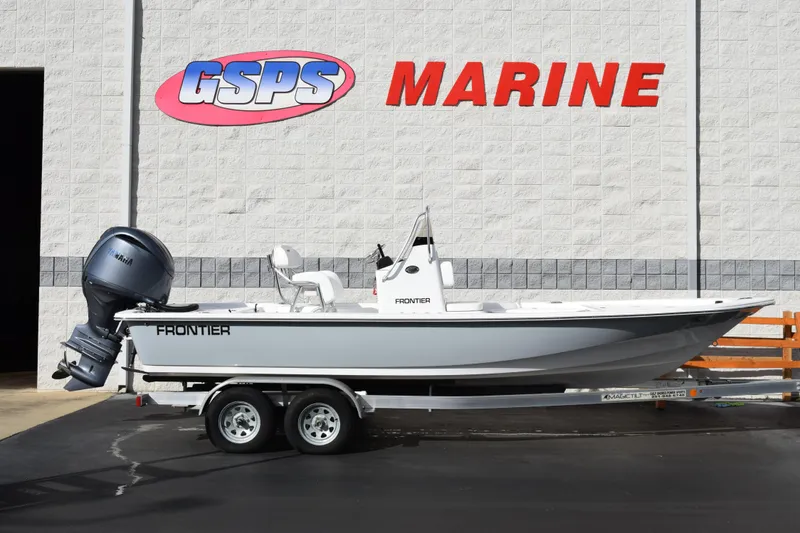 The Image of 2026 Frontier 2104 boat on trailer at GSPS Marine dealership. - 1
