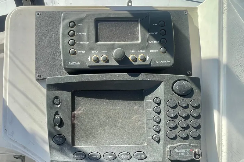 Slide: The Image of Control panel of a 1990 Spindrift COCKPIT MOTORYACHT with navigation and autopilot systems. - 21