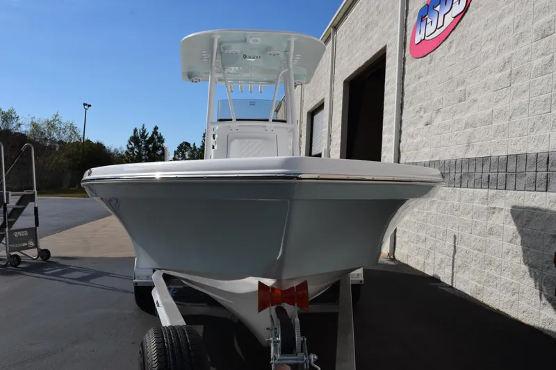 Slide: The Image of 2026 BlackJack 256 Bay boat on trailer outside a building. - 3