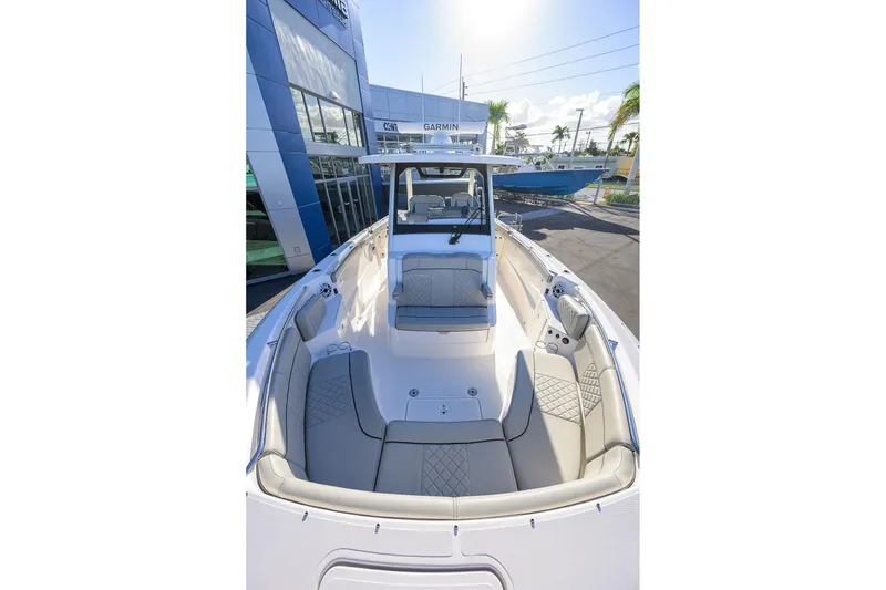Slide: The Image of 2023 Pursuit S 328 Sport boat with spacious seating and modern design. - 23