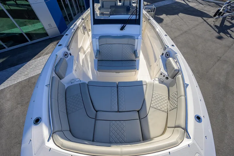 Slide: The Image of 2023 Pursuit S 328 Sport boat with luxurious seating and modern design. - 29