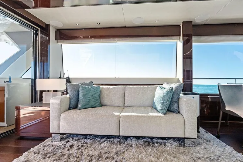 Slide: The Image of Luxurious interior of 2019 Sunseeker 76 Yacht with elegant sofa and ocean view. - 12