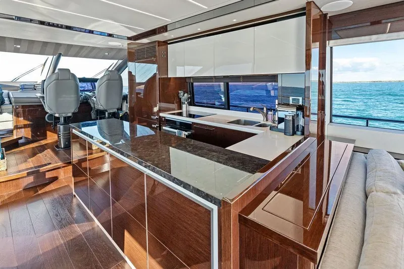 Slide: The Image of Luxurious interior of 2019 Sunseeker 76 Yacht with modern kitchen and ocean view. - 15