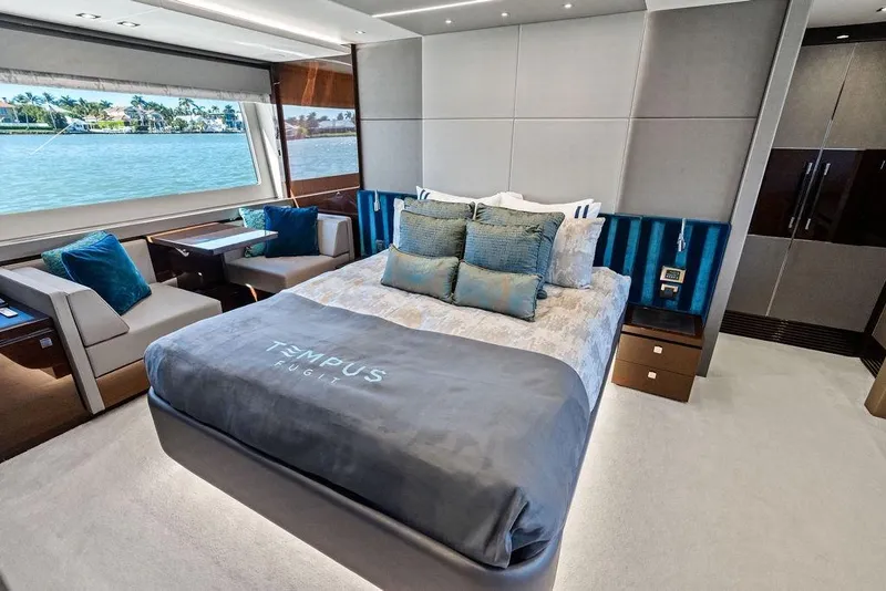 Slide: The Image of Luxurious interior of 2019 Sunseeker 76 Yacht with elegant bedroom and scenic ocean view. - 19