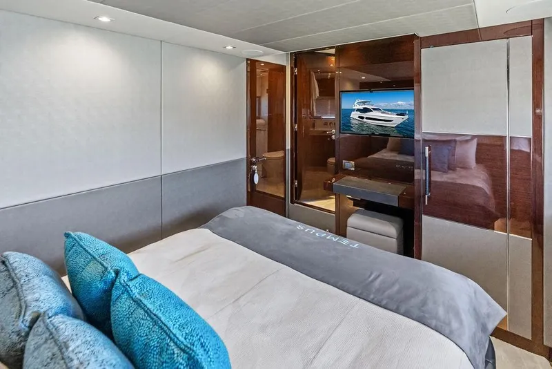Slide: The Image of Luxurious bedroom interior of 2019 Sunseeker 76 Yacht with modern decor and TV. - 25