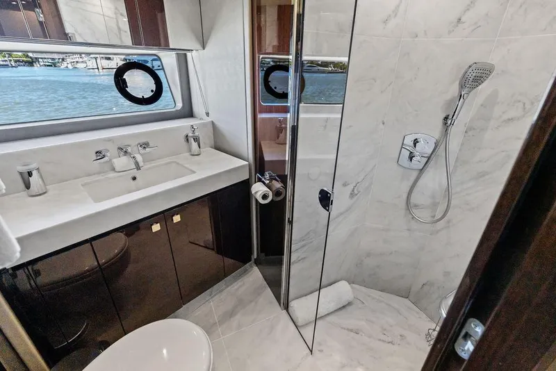Slide: The Image of Luxurious bathroom in 2019 Sunseeker 76 Yacht with marble shower and ocean view. - 29