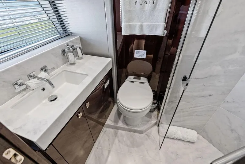 Slide: The Image of Luxurious bathroom in 2019 Sunseeker 76 Yacht with marble sink and modern fixtures. - 31