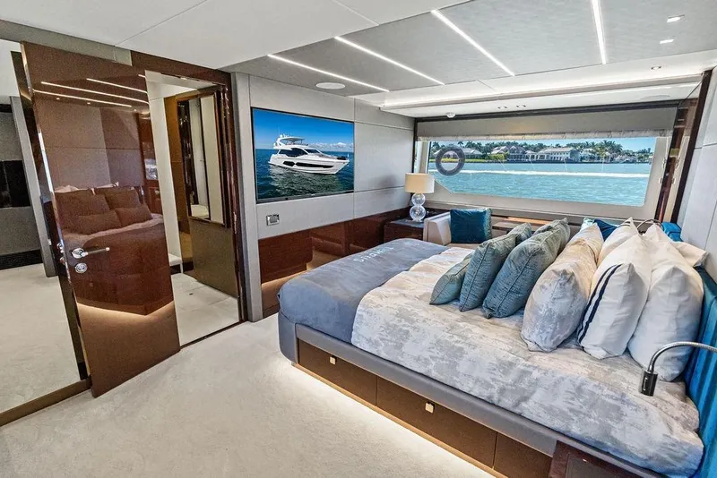 Slide: The Image of Luxurious bedroom interior of 2019 Sunseeker 76 Yacht with waterfront view. - 33