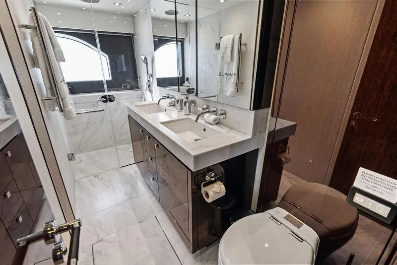 Slide: The Image of Luxurious bathroom in 2019 Sunseeker 76 Yacht with marble finishes and modern fixtures. - 34