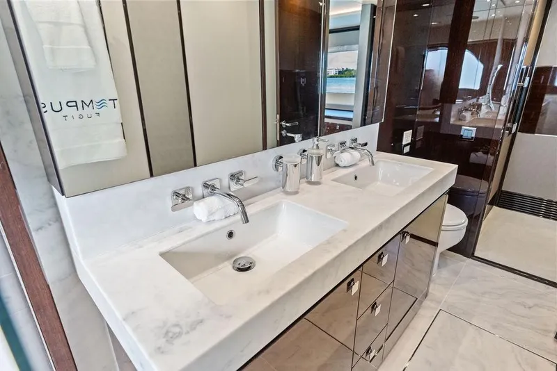 Slide: The Image of Luxurious bathroom in 2019 Sunseeker 76 Yacht with dual sinks and elegant fixtures. - 36